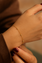 Load image into Gallery viewer, Elegant gold bead bracelet for women, dainty beaded chain design styled as versatile jewellery gift by MJ Luxe.
