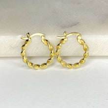 Load image into Gallery viewer, 18K gold plated sterling silver rope twist earrings against marble backdrop
